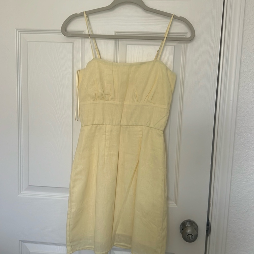 Francesca’s yellow mini dress